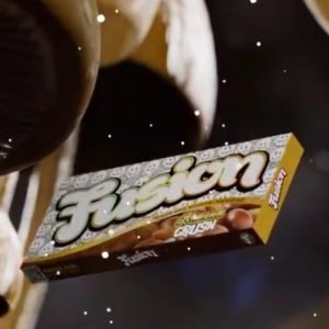 Fusion Almond Crush Chocolate Bar – rich chocolate bar filled with crunchy almond pieces, offering a perfect balance of smooth chocolate and nutty crunch